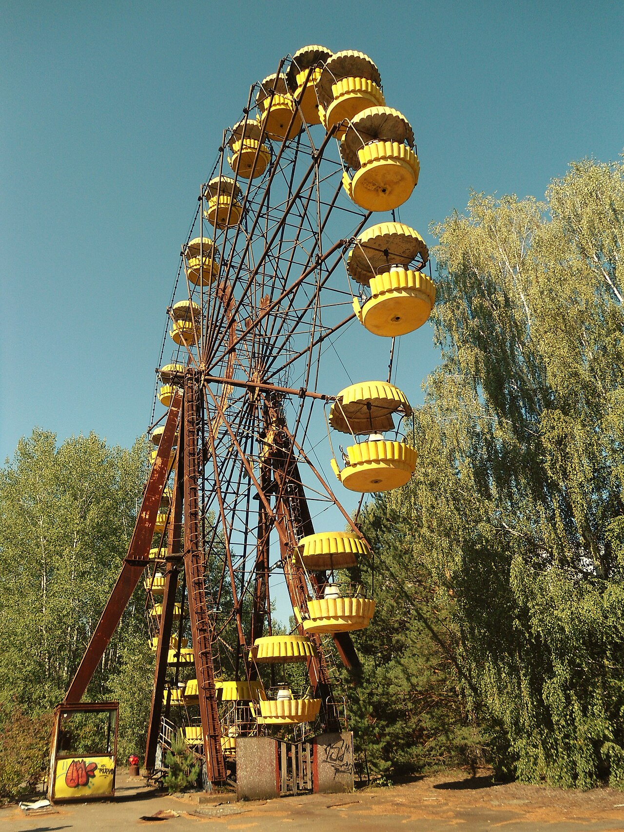 The rusting yellow Ferris wheel in the abandoned amusement park of Pripyat, Ukraine