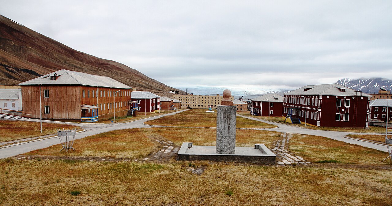 Soviet-era buildings of Pyramiden beneath the pyramid-shaped mountain in Svalbard