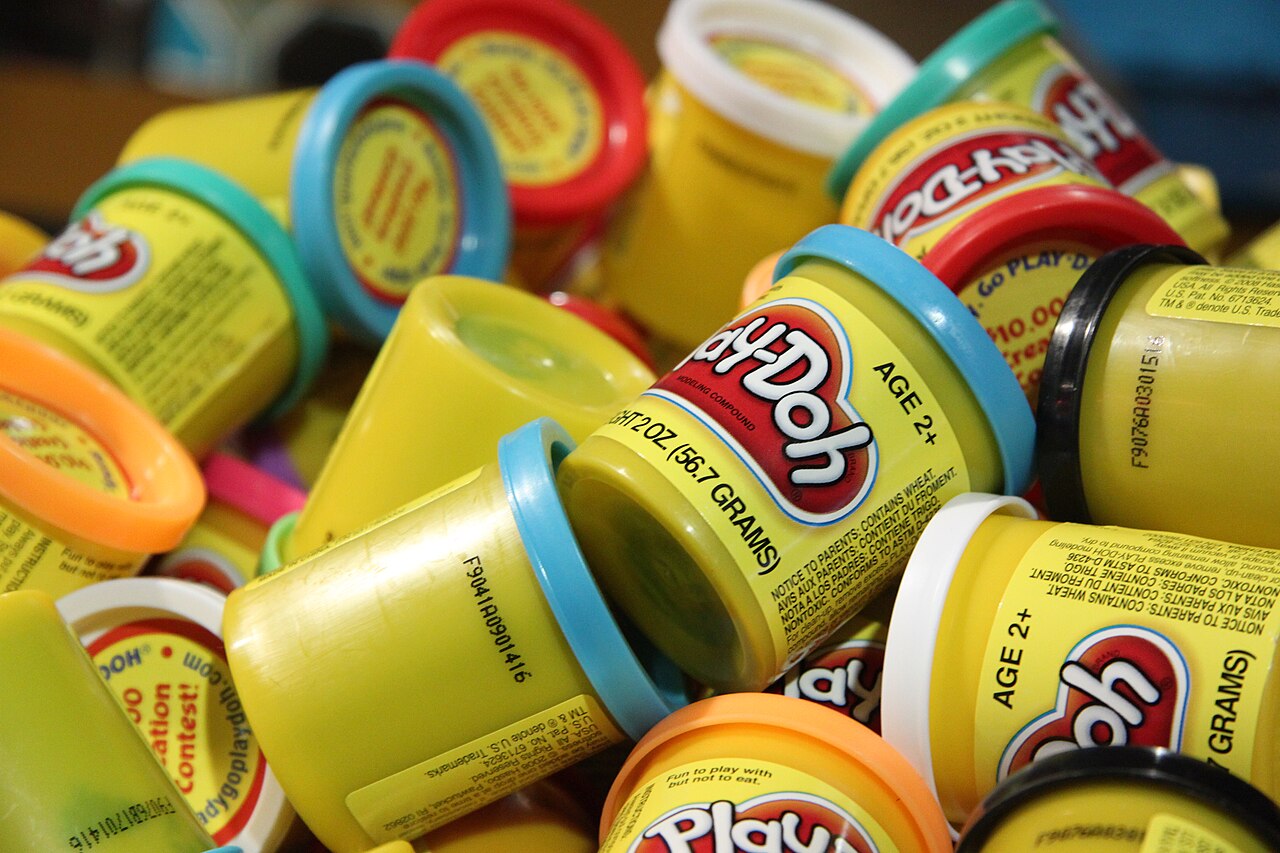 A container of Play-Doh, the colorful modeling compound made for children