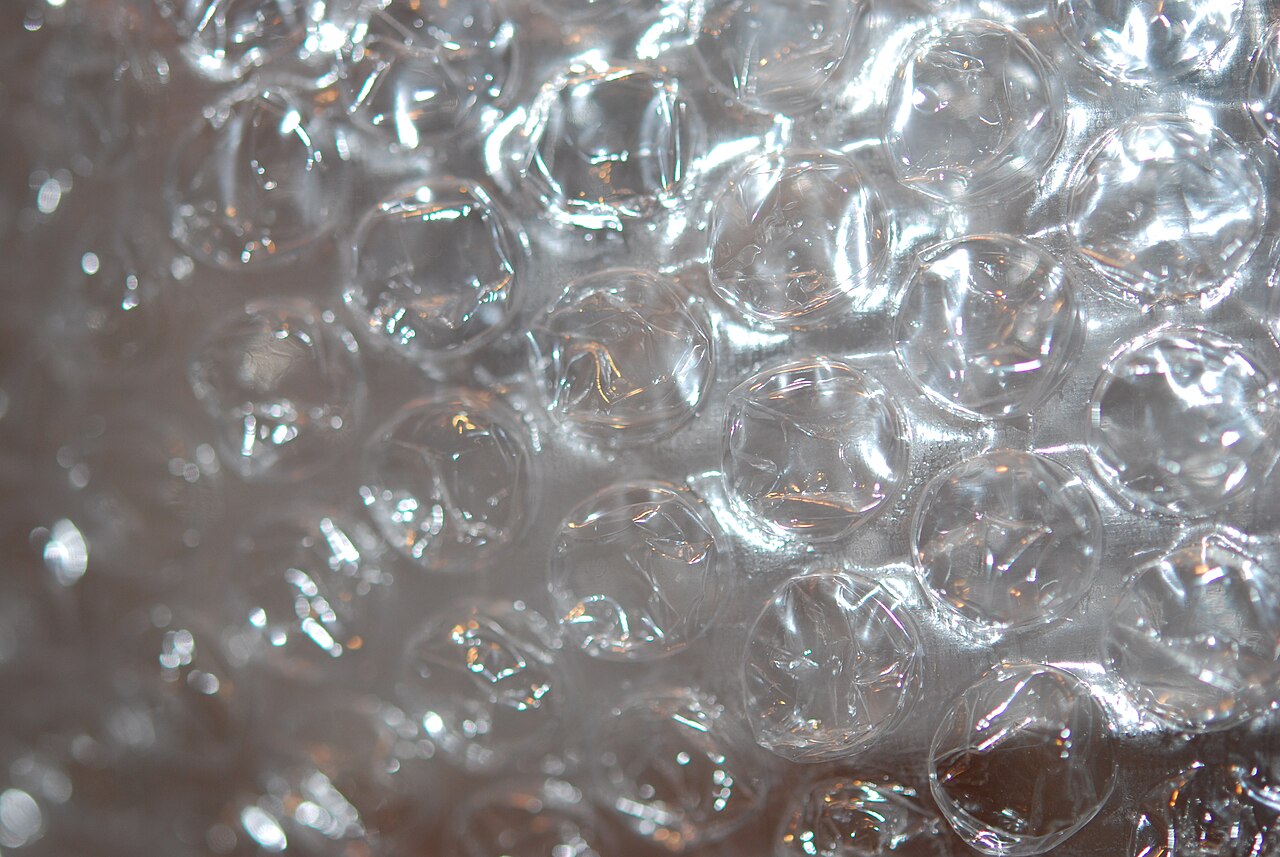 Sheets of Bubble Wrap, plastic packaging filled with rows of trapped air bubbles
