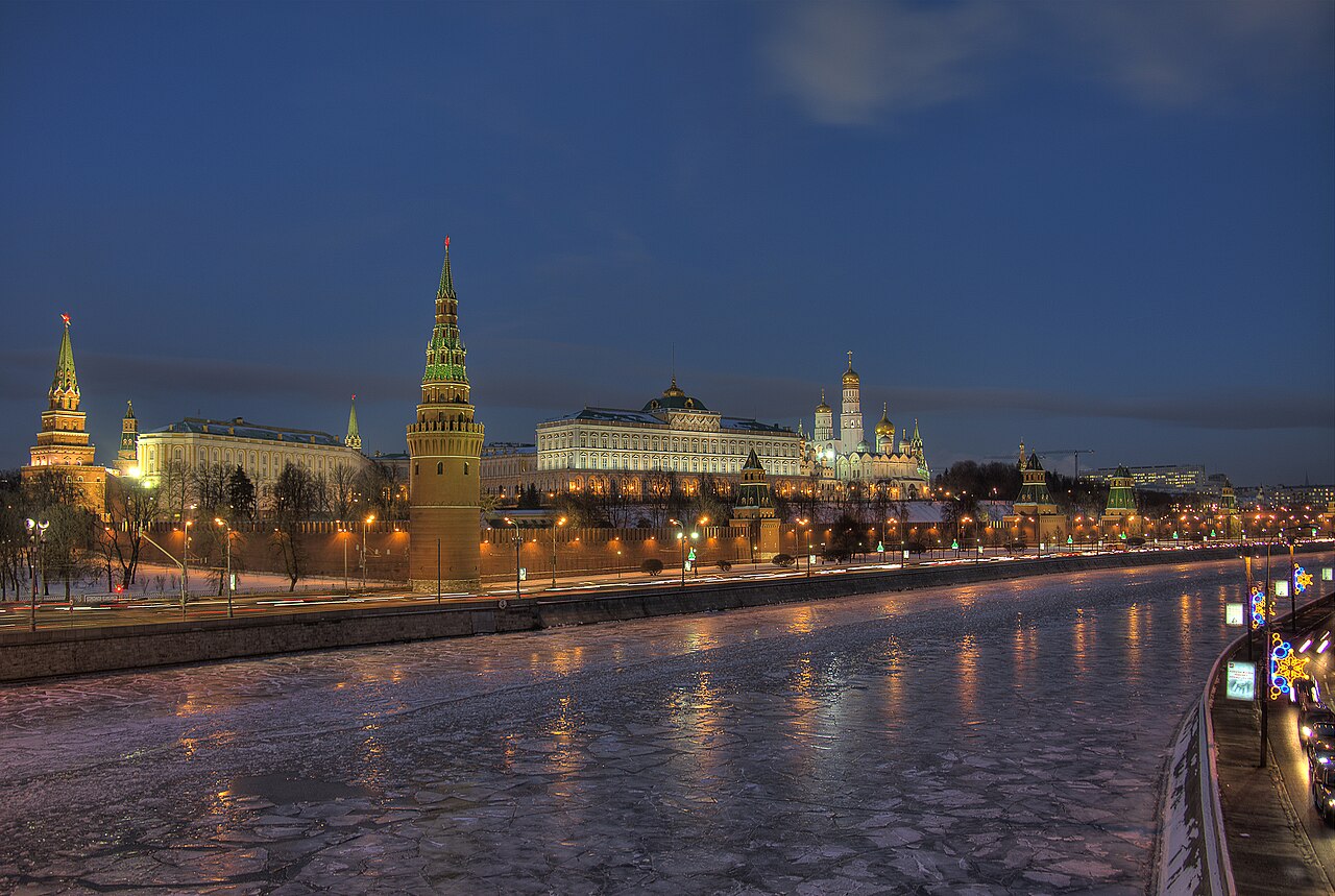 The red brick walls and towers of the Moscow Kremlin beside the Moskva River