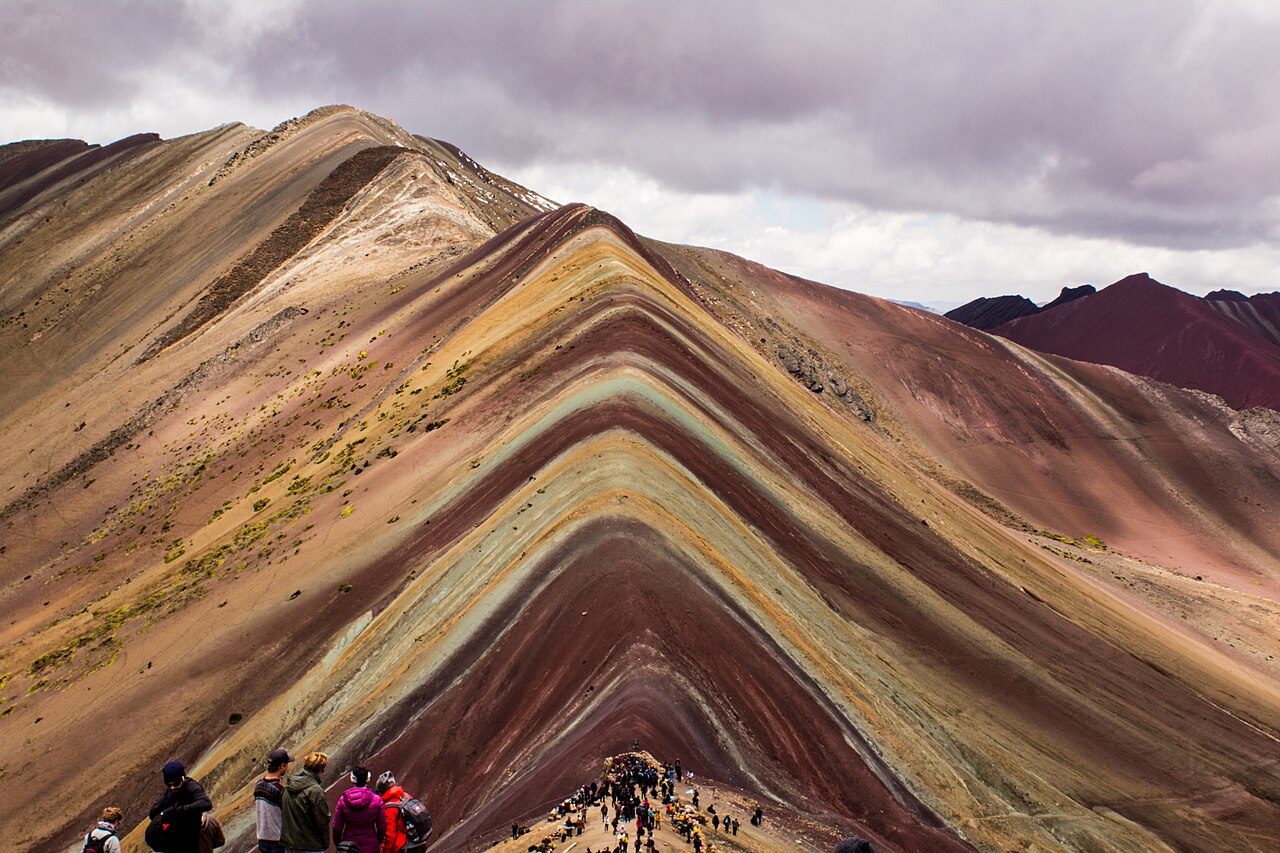 Colorful striped slopes of Vinicunca, the Rainbow Mountain, in the Peruvian Andes