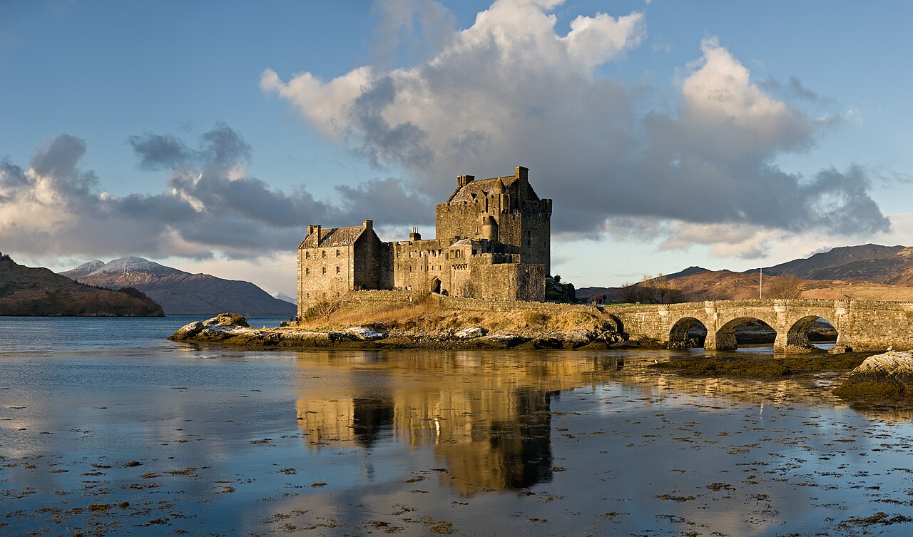 Eilean Donan castle on a small island joined to the shore by a stone bridge