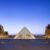 The glass Louvre Pyramid in the main courtyard of the Louvre Museum in Paris