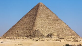 The Great Pyramid of Giza rising from the desert on the outskirts of Cairo, Egypt