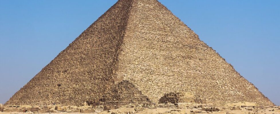The Great Pyramid of Giza rising from the desert on the outskirts of Cairo, Egypt