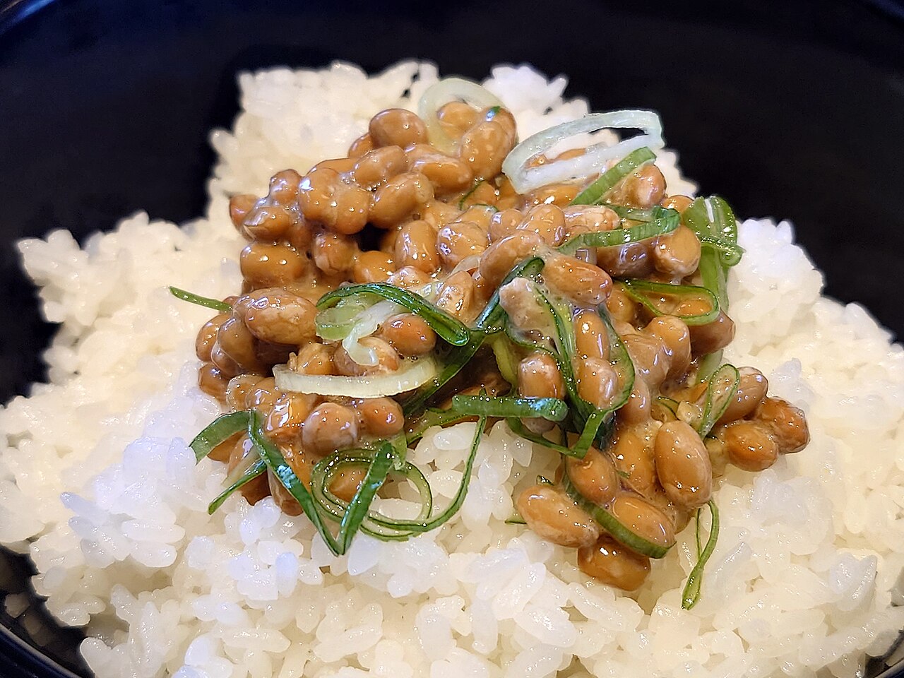 A serving of nattō, sticky fermented soybeans that stretch into fine strings